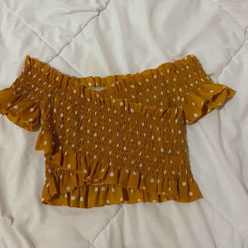Crisscross orange polka dot crop top